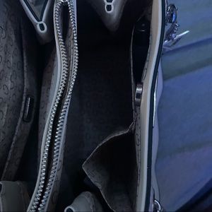 only worn twice. very beautiful bag!!